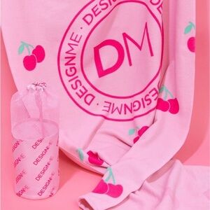 Pink DESIGNME beach towel with Cherry Print